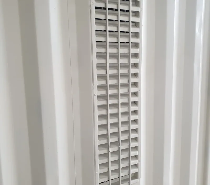 Detail of stacked louvred ventilation panels on a container wall